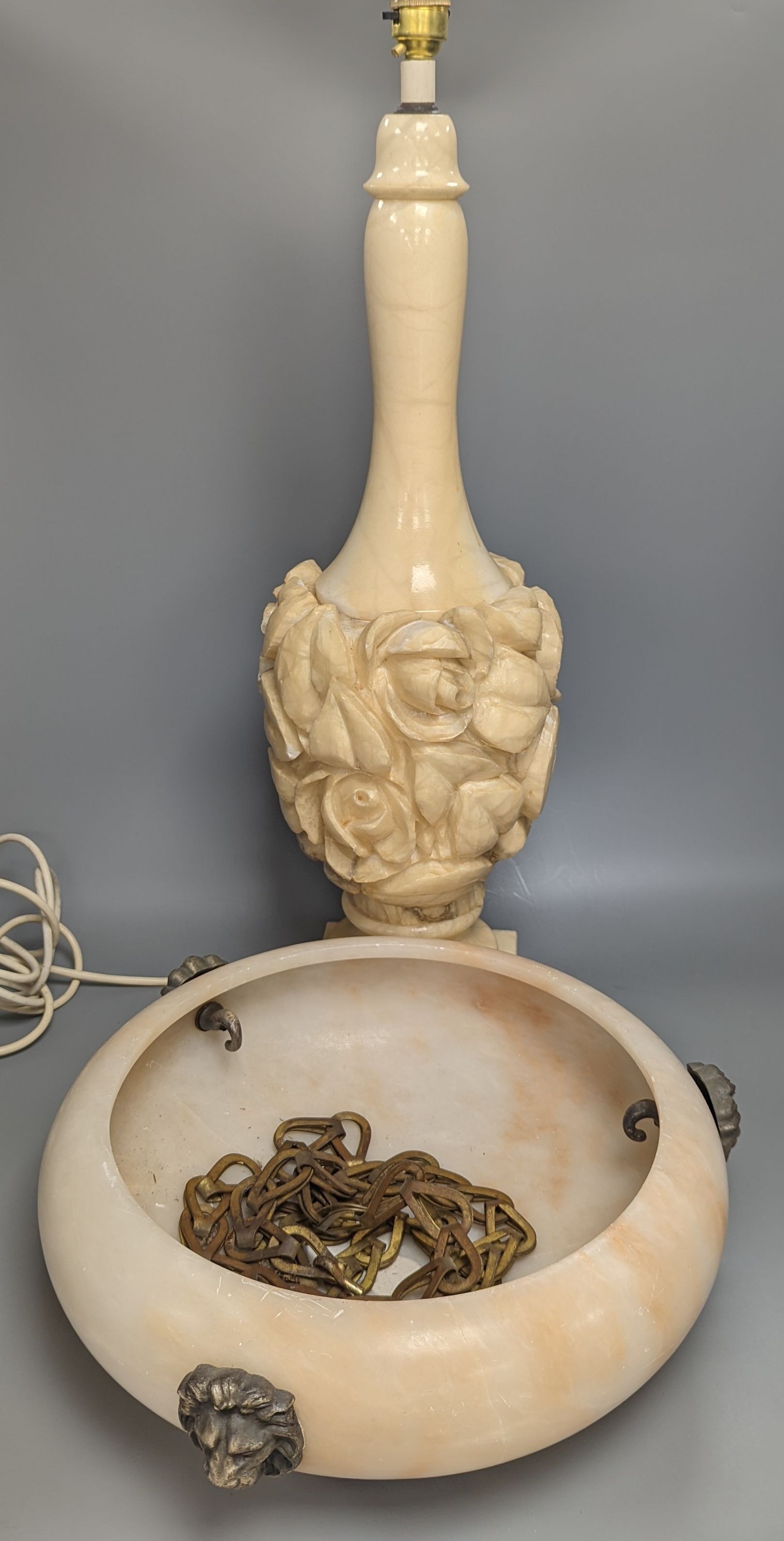 A carved alabaster lamp, height 60cm excl. light fitting, and a turned alabaster plafonnier, 35.5 cm diameter